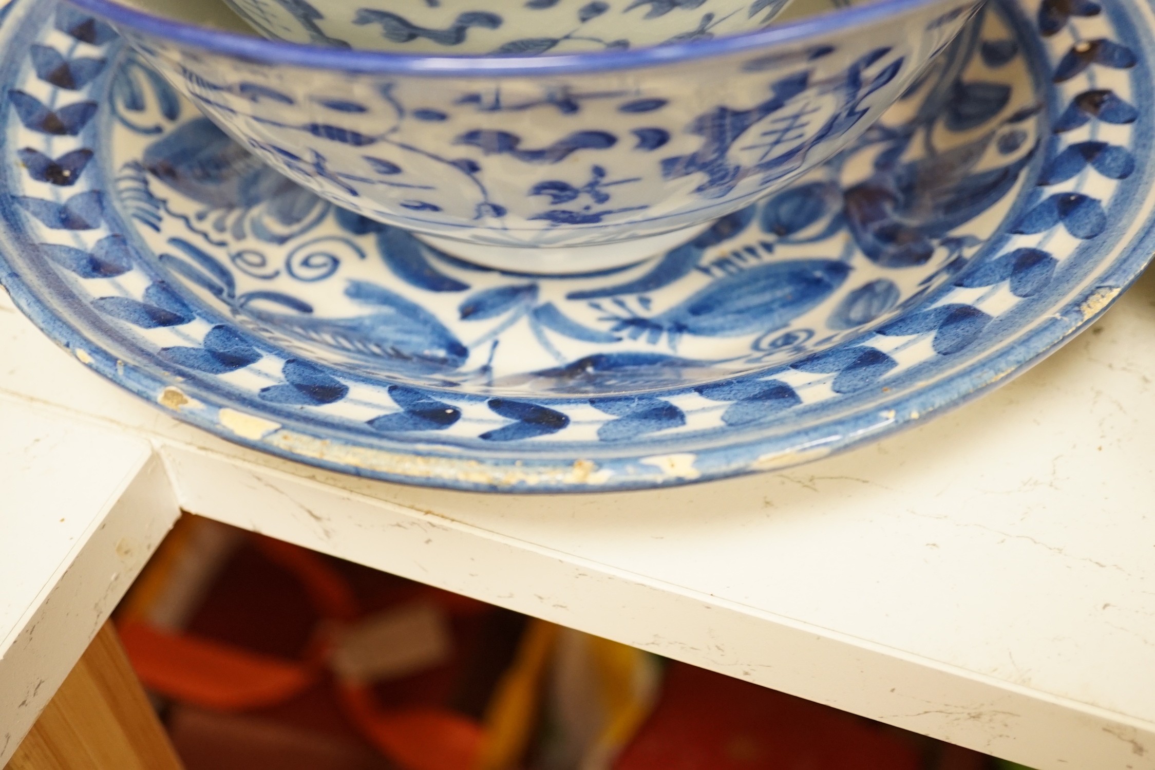 An assortment of 18th century and later Chinese porcelain, a tin-glazed earthenware charger and a Delft vase